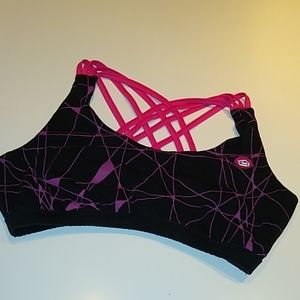 E9 size medium sports yoga bra. Criss cross detail